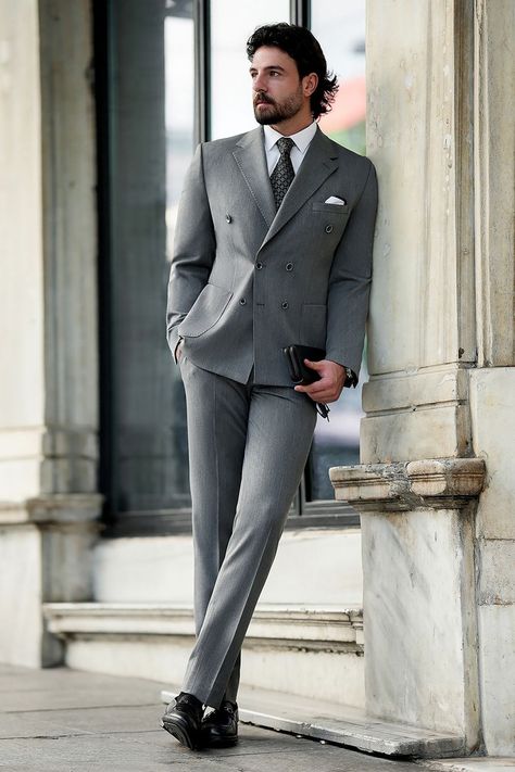 A suit that speaks for itself. The Grey Double Breasted Suit delivers impeccable style with a modern twist, making it the ideal choice for any man who demands presence and precision in his wardrobe. Own the room in grey.  #greysuit #doublebreastedsuit #businessstyle #professionallook #sleekandsharp #tailoredperfection #elevatedstyle #mensfashion #powerdressing #modernclassic Double Breasted Suit Men, Bow Tie Suit, Modern Fit Suit, Stylish Mens Suits, Suit Stores, Slim Fit Suit Men, Tuxedo Blazer, Slim Fit Suits, Fashion Suits For Men