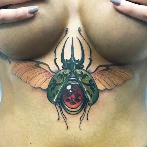 25 of the Best Unique Beetle Tattoos - Tattoo Insider Beetle Chest Tattoo, Beetle Tattoos, Scarab Beetle Tattoo, Rebirth Tattoo, Water Lily Tattoos, Beetle Tattoo, Face Tattoos For Women, Helmet Tattoo, Bug Tattoo