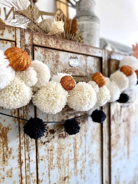 I love this combination for a DIY Halloween Pom Pom garland because it will also transition to fall. I don’t decorate a lot for Halloween now that the kids are away, but I thought it would be fun to add just a touch of DIY Halloween decor this year. I love pom poms! I find... The post DIY Halloween Pom Pom Garland appeared first on Hootshack. Diy Halloween Garland, Fall Decor On A Budget, Garland Tutorial, Fall Decor Diy Crafts, Halloween Decor Diy, Boho Halloween, Diy Halloween Decor, Pom Garland, Halloween Garland