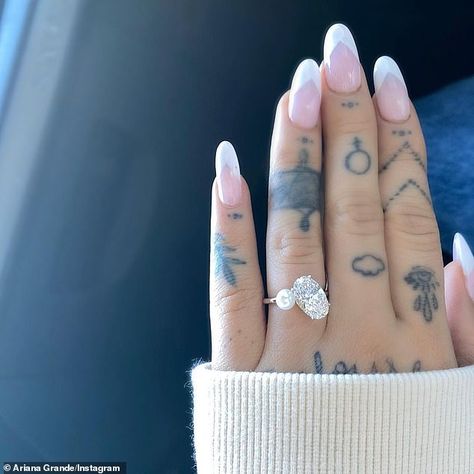 Ariana Grande announced she's ENGAGED to Dalton Gomez as she shows off stunning sparkler | Daily Mail Online Ariana Grande Nails, Dalton Gomez, Ariana Grande Tattoo, Ring Tattoo, Engagement Nails, Finger Tats, Ring Tattoos, Nail Ring, Promise Rings For Her