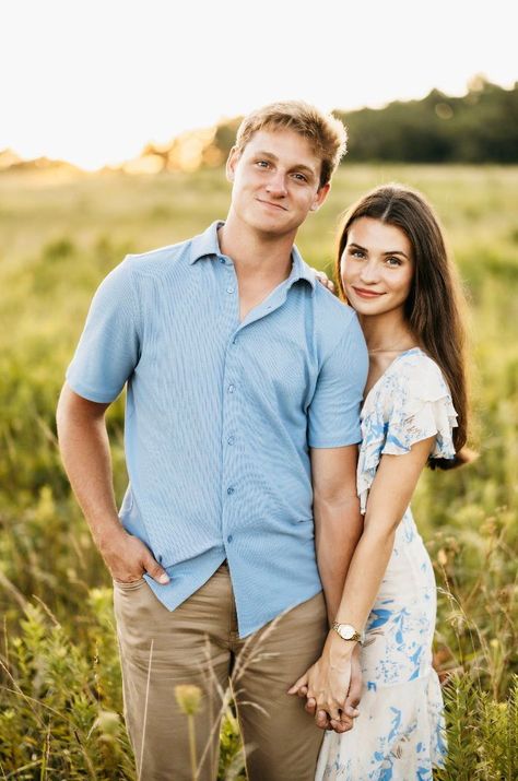 Georgia based wedding and couples photographer captures a beautiful summer engagement photoshoot in an open field filled with wildflowers at sunset. Showing the couple running through the field, picking flowers, and stealing kisses.    #summerengagement #wildflowerfield #georgiaengagementphotographer #engagementphotoideas #engagementoufitideas #coupleposinginspiration Front Facing Couple Poses, Couple Big Height Difference, Different Couple Poses, Couples Session Poses, Couple Poses Looking At Camera, Husband Wife Picture Poses, Summer Photoshoot Ideas Couples, Couple Sunset Pictures Field, Outdoor Poses For Couples