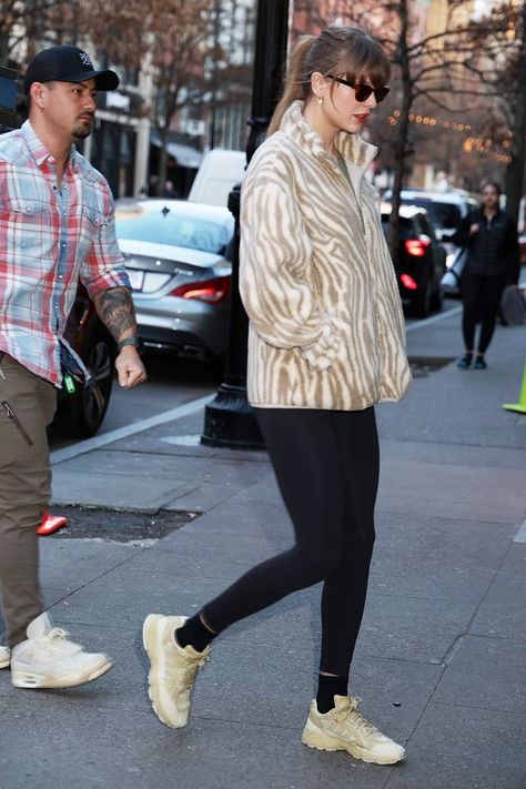 Taylor Swift Wore a Rugged Sneaker Trend With Leggings | Who What Wear Taylor Swift Street Style, Sneaker Trend, Luxury Sneakers, January 11, Trending Sneakers, Taylor Swift Style, Recording Studio, The Trend, Rarity