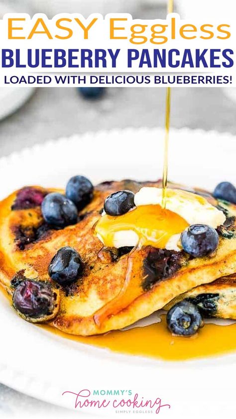 These Eggless Blueberry Pancakes are most definitely not a weekend-only treat! They’re light and fluffy, loaded with delicious blueberries and made from scratch! A guaranteed family favorite. This easy recipe makes eggless pancakes that are light and fluffy and only calls for a few simple ingredients you probably have in your kitchen right now. | @mommyhomecookin #egglessbreakfastrecipes #egglesspancakes #egglessrecipes Eggless Pancakes, Eggless Breakfast, Family Friendly Breakfast, Blueberry Pancakes Recipe, Blueberry Pancake, Pancake Calories, Pancake Bites, Eggless Recipes, Recipes With Few Ingredients