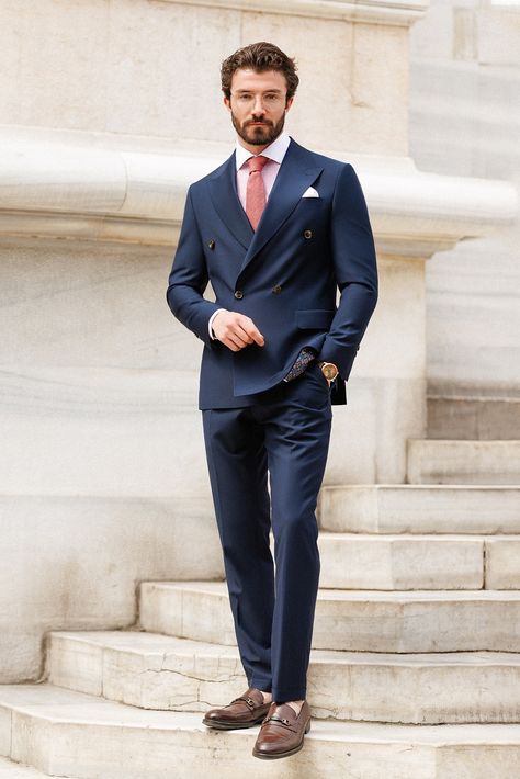 Redefine elegance with our Navy Double Breasted Suit 2-Piece collection, designed to make a lasting impression. The double-breasted blazer's 4-button front and peak lapels embody refined style. The functioning buttoned cuffs add an extra layer of sophistication. #doublebrasted #navysuit #formalattire #formalwear #mensfashion #suitup #tailored #specialoccasion #sophisticatedstyle #polishedlook #dapper #suit #mensstyle #fashion #gentleman Navy Double Breasted Suit, Black Double Breasted Suit, Double Breasted Suit Men, Suit Styles, Double Breasted Tuxedo, Suit Stores, Slim Fit Suit Men, Slim Fit Tuxedo, Jacket Suit