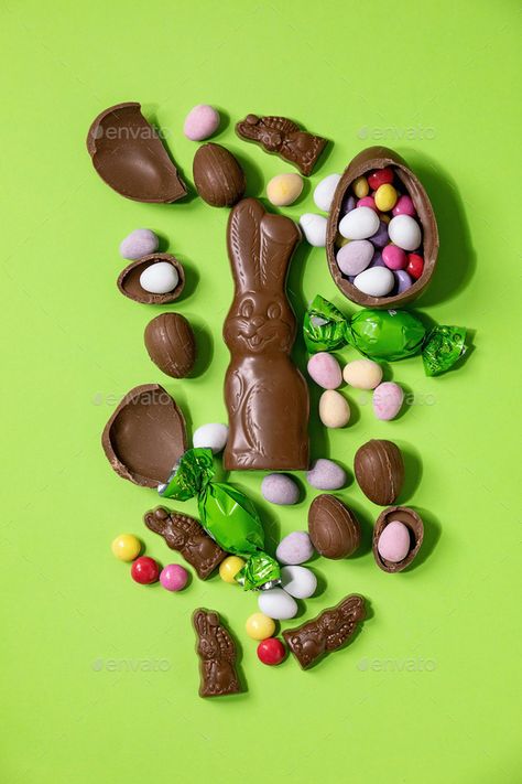 Easter greeting card by NatashaBreen. Easter greeting card with chocolate sweets rabbit, candies and eggs on bright green background. Flat lay, copy space. #AD #sweets, #chocolate, #candies, #rabbit Easter Candy Photography, Easter Product Photography, Baking Flatlay, Candy Photography, Trendy Easter, Sweets Chocolate, Easter Photoshoot, Easter 2024, Artsy Photography