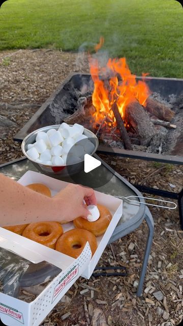 Hannah Gray | One Sweet Mama on Instagram: "Original glazed with a touch of 🔥 and a gooey marshmallow center #donuts #bonfire #marshmallows" Cooking Over A Campfire, Camp Desert Ideas, Dessert Recipes For Camping, Desserts Over Campfire, Campfire Donuts Recipe, S'more Combinations, Camping Donuts Recipe, Food To Roast Over Campfire, Camping Deserts Over Fire