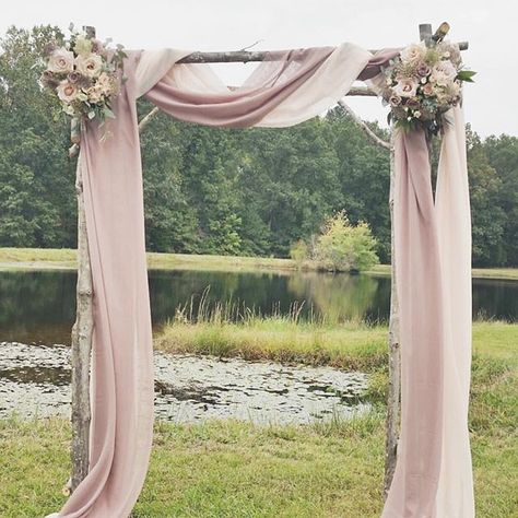 Sometimes I still swoon over this ceremony arbor from a wedding last October. The structure itself was built from trees on the family's property. The flowing sheer drapery and awe-inspiring floral arrangements were created by the masterfully talented @sefloraldesigns. Sometimes elegant simplicity with a meaningful purpose to treasure family history is more impactful than being wildly elaborate. Simple Wedding Arch, Wedding Ceremony Setup, Wedding Arbors, Backdrop Fabric, Wedding Ceremony Arch, Wedding Arbour, Arch Decoration, Arch Decoration Wedding, Wedding Arches