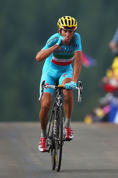 LA PLANCHE DES BELLES FILLES, FRANCE - JULY 14: Vincenzo Nibali of Italy and the Astana Pro Team bites his thumb in honour of his recently born daughter as he celebrates crossing the finish line to win the tenth stage of the 2014 Tour de France, a 162km stage between Mulhouse and La Planche des Belles Filles, on July 14, 2014 at La Planche des Belles Filles, France. (Photo by Bryn Lennon/Getty Images) Khabib Vs Mcgregor, Crossing The Finish Line, Vincenzo Nibali, Cycling Men, Road Bicycle Racing, Tony Martin, Cycling Pictures, Cycling Photography, Bicycle Sport