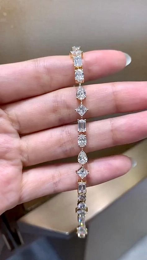 Multi Shape Moissanite Diamond Bracelet (0.50ct 3pc) oval, pear, princess, and emerald cuts, crafted with love and care in New York City, Luxury Jewelry 𝐃𝐞𝐭𝐚𝐢𝐥𝐬: ◈ 𝐒𝐭𝐨𝐧𝐞 𝐓𝐲𝐩𝐞: Moissanite / Cubic Zirconia / Lab Grown Diamonds Diamond Type : Moissanite & (Lab Grown Diamonds available on request) Oval:  6x4 mm. (0.50 ct 3pc) princess:  4.5 mm. (0.50 ct 3pc ) Emerald:  6x4 mm. (0.50 ct 3pc) Pear:  6x4 mm.(0.50 ct 3pc) Diamond Color: DEF Diamond Clarity: VS-VVS ertification: Non-Certi Elegant Silver Emerald Cut Tennis Bracelet, Luxury Silver Emerald Cut Diamond Bracelet, Elegant Emerald-cut Diamond Bracelet Gift, Luxury Elegant Baguette-cut Bracelet, Luxury Elegant Diamond-cut Bracelet, Luxury Bridal, Women Diamond, Wedding Jewelry Bracelets, Engraved Items