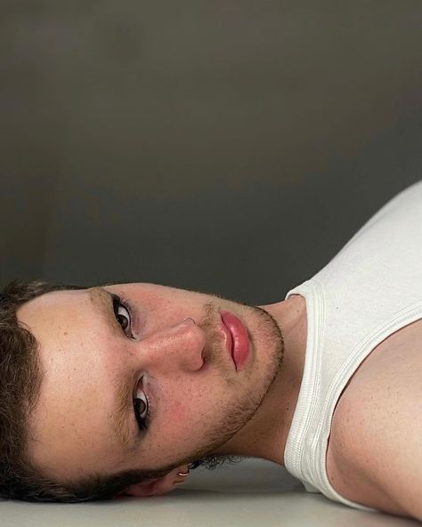 Boy with short hair bleached blond brows wearing a smokey eye look laying down Men Smokey Eye, Bleached Brows, Bleached Eyebrows, Pose Reference Photo, Smokey Eye, Pose Reference, Black Men, Eyebrows, Bleach