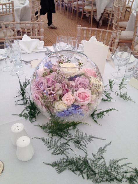 Fishbowl Flower Centerpiece, Flowers In Fish Bowl Vase, Fishbowl Flower Arrangements, Fish Bowl Flower Arrangements, Submersible Centerpieces, Pastel Wedding Centerpieces, Diamonds Outfit, Fish Bowl Decorations, Lilac Wedding Themes