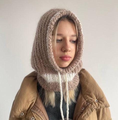 Knitted scarf with a hood is made from a mixture of wool and acrylic yarn. The drawstring on the hood will help tighten the opening and protect from the wind. The wide collar can be tucked under a coat or jacket, as well as covering the shoulders. The main version of the hood is made in beige. Another color option is light lemon with white trim and dark pink yarn with lurex. Product information: 60% mohair wool, 40% acrylic Can be hand washed with warm water. Knitted Hood Scarf, Knitted Hooded Scarf, Knitted Snood, Hooded Scarf Pattern, Hoodie Scarf, Snood Scarf, Hooded Scarf, Knitted Hood, Pink Yarn