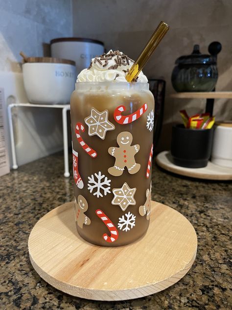 Enjoy your favorite iced coffee in the cutest Christmas treats themed cup! Makes the perfect gift as well 🎄  All my items are made with love and handled with care <3 Comes with a plastic clear straw.  Option for a glass straw is in the drop down  Design is made with permanent, high-quality vinyl. Care instruction card included in package. Care Instructions:  Hand wash with light soap and cool water only.  Do not scrub. Do not soak. NOT microwave or dishwasher safe. Avoid exposure to extreme hea Christmas Iced Coffee Starbucks, Coffee Glass Cup Design Christmas, Cricut Cup Ideas Vinyls, Christmas Glass Cups, Cricut Christmas Ideas, Bamboo Cups, Christmas Cups, Christmas Props, Cute Coffee Cups