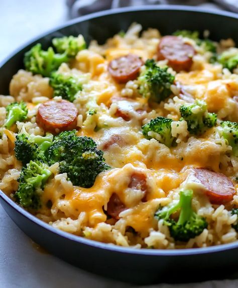 Cheesy Kielbasa Rice And Broccoli Skillet Recipe - sandyrecipes.com Kielbasa Broccoli Bake, Kielbasa Broccoli Rice, Kielbasa Broccoli Recipes, Kielbasa Veggie Skillet, Kielbasa Broccoli Pasta, Dinner Recipes With Sausage Kielbasa, Kielbasa Skillet Dinner, Kielbasa And Broccoli Recipes, Kielbasa Rice Recipes