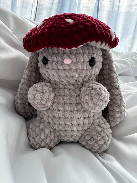 Cute and soft bunny with a mushroom top. Colors are customizable. Size (inches): 8x6x4.5 Pattern by: @cottage.crochet.us