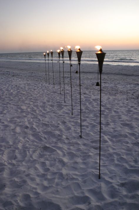 Beach Wedding - Tiki torches at sunset Beach Bonfire Parties, Beach Wedding Candles, Countdown App, Sunset Beach Weddings, Sunset Party, Bonfire Party, Beach Bonfire, Wedding Expenses, Tiki Torches