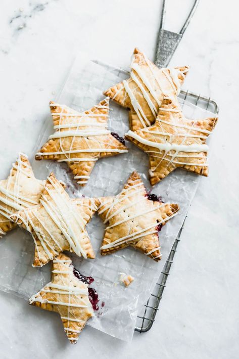 White Chocolate Blueberry Star Shaped Hand Pies - Broma Bakery Blueberry Hand Pies, Chocolate Blueberry, Broma Bakery, Blueberry Chocolate, Hand Pies, Pie Dough, Food Blogs, Cannoli, Pavlova