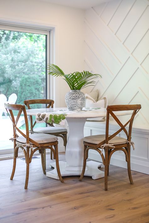 Love this accent wall in the Dining room of this recent remodel done by White House Designs.  www.instagram.com/whitehousedesigns.ca White Textured Accent Wall, Accent Wall In White Kitchen, White Panel Wallpaper Accent Wall, White Wallpaper Dining Room, Accent Wall White, Accent Wall Kitchen Nook, Kitchen Nook Accent Wall, Small Dining Room Accent Wall, White Accent Wall