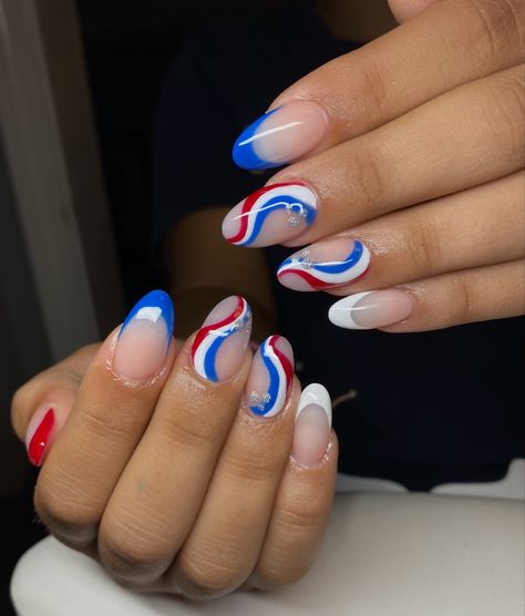 Fourth of July inspired nails. Almond Nails Fourth Of July, Pretty Royal Blue Nails, French Tip Nails With Design Fourth Of July, White Red And Blue Nails, 4th Of July Swirl Nails, 4 Of July Nails Gel, Red And White Striped Nails, July 4 Th Nails Designs, 4th Of July French Nails