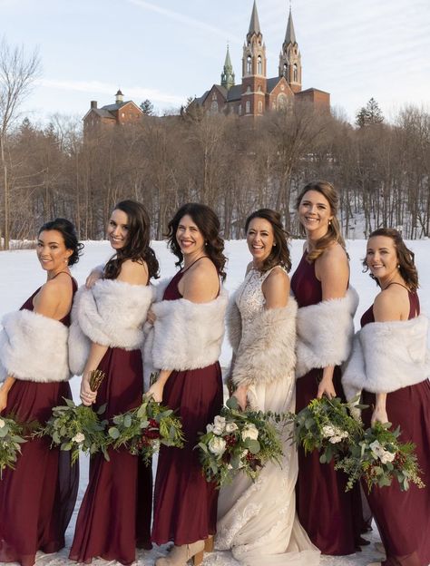 Order Number: 2199468934 Photographer: https://allyshanoellephotography.com/ @allyshanoellephotography Burgundy Bridesmaid Dresses Winter, Christmas Barn Wedding, Faux Fur Shawl Wedding, Maroon Bridesmaid, Christmas Wedding Inspiration, Fur Shawl Wedding, Silver Bridesmaid Dresses, Winter Bridesmaid Dresses, Wine Red Dress