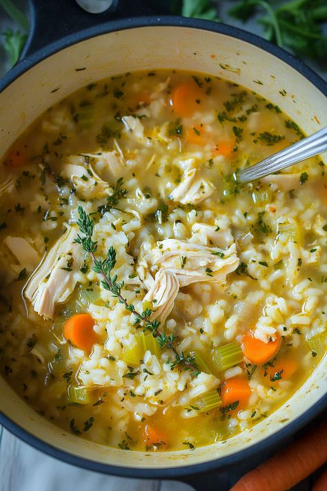 Cozy up with a bowl of hearty Chicken Rice Soup! Packed with tender chicken, fluffy rice, and vibrant veggies in a flavorful broth, this comforting classic is perfect for chilly nights or a quick family dinner. Easy to make, healthy, and irresistibly delicious, this soup is a must-try for your next meal plan. #ChickenSoup #RiceSoup #ComfortFood #HealthyRecipes #EasyDinnerIdeas Pumpkin Rice Soup, Quick Family Dinners, Chicken Pumpkin, Homemade Chicken Soup, Fluffy Rice, Comfort Soup Recipes, Chicken Rice Soup, Rice Varieties, Hearty Chicken