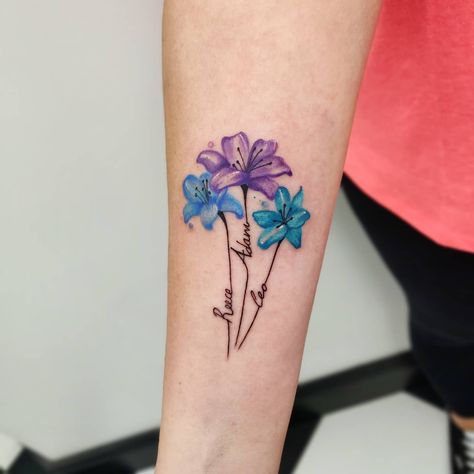 30+ Inspirational and Cute Kids Name Tattoo Ideas for 2023 - 100 Tattoos Beautiful Name Tattoos, Grandkid Name Tattoos, Tattoo Of Grandkids Names, Birth Flower With Initial Tattoo, Tattoo Ideas For Grandchildren Names, Tattoo For 3 Daughters, Children’s Tattoo Ideas, 3 Names Tattoo Ideas For Women, Tattoo Kids Names For Women