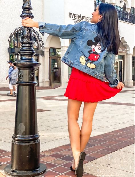 What to wear to Disney so that you’re festive, but still stylish! - Mickey Denim Jacket, Disney Jean Jacket, Red Dress, Minnie Ears. Stylish Disney Outfit Disney Jean Jacket, Red Mini Skirt Outfit, Disney Dudes, What To Wear To Disney, Disney Jacket, Disney Outfits Women, Red Mini Skirt, Miniskirt Outfits, Disney Dresses