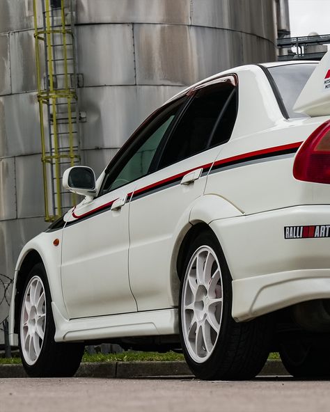 We collaborated with world-class vehicle sourcing specialist Power Play Global to bring this rare gem to life for true enthusiasts seeking to own a piece of Japanese automotive history. The Legendary Mitsubishi Evo 6 Tommi Mäkinen Edition, dominating the city streets with its unrivaled road presence. - Engine: 2.0L Turbocharged Inline-4 - Power Output: 276 bhp (official) - actual output often closer to 300 bhp - Torque: 373 Nm (275 lb-ft) - 0-60 mph: 4.4 seconds - Top Speed: 150 mph (240 km... Evo 6, Mitsubishi Evo, Engine 2, Rare Gems, City Streets, The City, Bring It On, Cars, Quick Saves