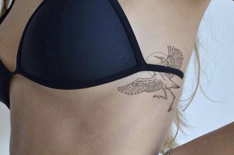 Crane Hip Tattoo, Stork Tattoo Minimalist, Stork Tattoo, Sun Tattoo Design, 24 Tattoo, Bird Tattoo Ribs, Crane Tattoo, One Line Tattoo, Sun Tattoo Designs