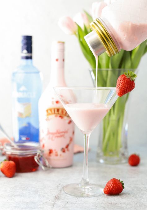 Strawberry Shortcake Martini | Simply Made Recipes Strawberries And Cream Martini, Bailey Strawberry And Cream Recipes, Strawberry Cream Liquor Recipes, Baileys Valentines Day Drinks, Valentines Martini Drink Recipes, Pink Valentines Cocktails, Strawberry Shortcake Martini, Strawberry And Cream Baileys Drinks, Strawberry Shortcake Cocktail