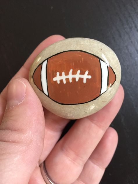 #Football #rockpainting #paintedrocks #rock #paint #kellyrocks Football Rock Painting, Sports Rock Painting Ideas, Football Painted Rocks Ideas, Football Rock Painting Ideas, Thanksgiving Rock Painting Ideas, Thanksgiving Rocks, Skipping Rocks, Football Paintings, Painted Seashells