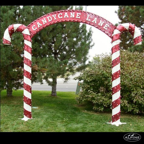 CandyCane_Archway Diy Candy Cane Lane Decorations, Candy Cane Entrance, Candy Cane Lane Outdoor Decorations, Christmas Doorway Arch, Candy Cane Archway Diy, Christmas Archway Decor Outdoor, Gingerbread Archway, Driveway Christmas Decorations, Outdoor Christmas Arch