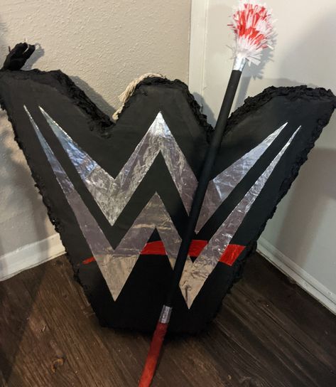 Made with Cardboard, Twine and Paper Mache. Decorated with Paper Crepe, Acrylic Paint and Metallic Paper Wwe Birthday Party Ideas Free Printable, Wwe Birthday Party Ideas Decoration Diy, Wwe Party Decorations, Wwe Pinata, Wrestling Birthday Party Ideas, Wrestlemania Party, Wwe Decorations, Wrestling Birthday Cakes, Wwe Birthday Party Ideas