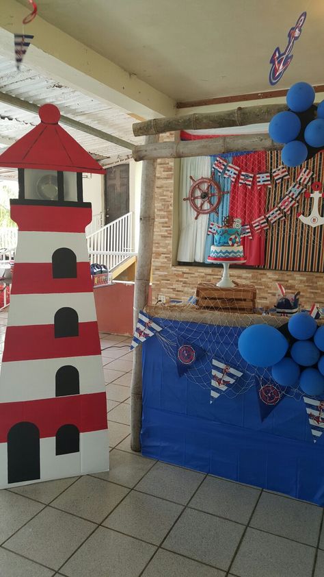 Lighthouse Door Decoration, Ship Classroom Theme, How To Make A Lighthouse For Vbs, Lighthouse Party Theme, Vbs Lighthouse Decor, Diy Lighthouse Decor, Lighthouse Decor Ideas, Lighthouse Theme Party, Lighthouse Vbs Decorations