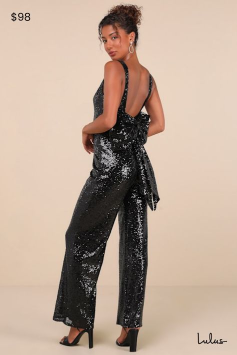 Walking in like you own the place is exactly how the Lulus Feeling Sparkly Black Sequin Bow Wide-Leg Jumpsuit is supposed to make you feel! This fabulous jumpsuit is sure to make you the shiniest sight in any room with its dazzling black sequin composition that shapes a princess-seamed bodice with a V-neckline and a flirty open back design, all supported by wide straps. The high fitted waist tops trendy wide pant legs that fall to ankle-grazing hems. The dramatic, oversized bow detail at the bac