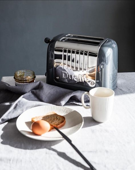 Boasting classic styling with a contemporary gloss finish, the ever-popular Lite Toaster has been thoughtfully designed with practical and patented features. The Lite Toaster also benefits from a bagel toasting option, defrost function, extra-wide 36mm slots for thick sliced bread and automatic pop-up. A Lite Kettle is also available to buy for the perfect matching set. #dualit #toast #toaster #toasterideas #kitchendecor #kitchentoasters #kitcheninspiration #kitchendecor #kitchendesignideas Dualit Toaster, Sliced Bread, Toasters, Afternoon Snacks, Kitchen Inspirations, Healthy Breakfast, Pop Up, Slots, Kitchen Design