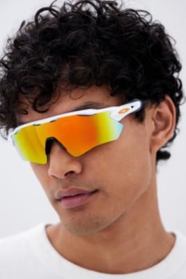 Oakley Radar® sunnies in a visor design where performance meets style. Features a taller lens design with an extended range of view in the upper peripheral region. **Content + Care** \- Plastic \- Wipe clean | Oakley Radar Ev Path Polished White Fire Iridium Sunglasses - Orange at Urban Outfitters Oakley Radar Ev Path, Oakley Radar Ev, Orange Fits, Mens Home, Sunglasses Shop, Lifestyle Brands, Sunnies, Latest Fashion, Urban Outfitters