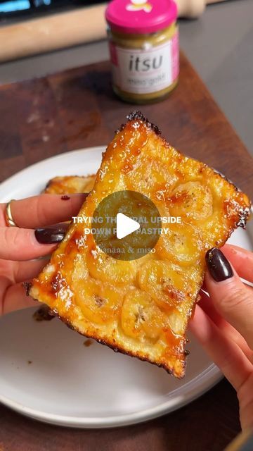 333K views · 7.7K likes | Emily English on Instagram: "Trying the viral upside down puff pastry dessert 
 
AD| I have been seeing this viral dessert hack all over my socials so I thought I would give it a try. I am obsessed with the taste of sweet miso in desserts and @itsuofficial miso’gold paste is honestly the best. I mix the miso in with honey and spread over baking parchment before topping with slices of banana. lay over a slice of puff pastry, brush with an egg wash and bake until crisp, golden and caramelised. The combination of sweet, salty, and umami is just heaven. Serve with a scoop of ice cream or yoghurt for a simple sweet treat. Feel free to swap the bananas for apple or pears!
 
You will need 
Ready rolled puff pastry 
1 heaped tsp itsu miso’gold 
1 tbsp honey 
1 medium bana Upside Down Puff Pastry, Puff Pastry Dessert, Dessert Ad, Emily English, Beautiful Baking, Dessert Hacks, Scoop Of Ice Cream, Puff Pastry Desserts, Pastry Brush