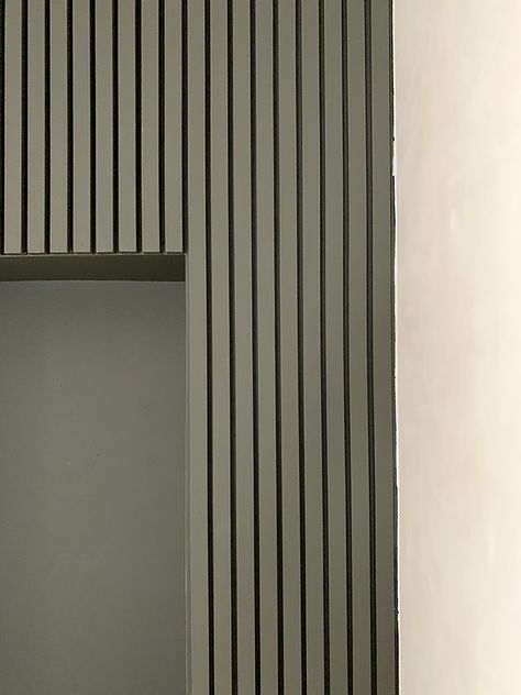 Slat Panelling Hallway, Painted Wood Slats On Wall, Green Slat Wall Bedroom, Basement Slat Wall, Wood Slat Wall With Window, Green Wood Slat Wall, Painted Wood Slat Wall, Slat Wall Stairwell, Slat Wall Green