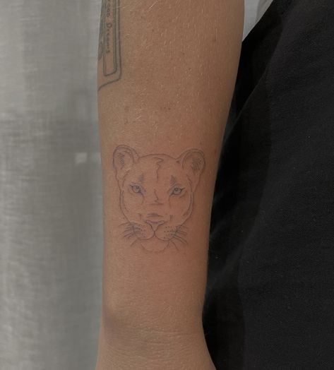 Lioness Head Tattoo, Lioness Tattoo Fine Line, Deltoid Tattoos For Women, Small Lioness Tattoo, Minimalist Leo Tattoo Women, Lion Tattoo For Women Fine Line, Dainty Lion Tattoo, Small Puma Tattoo, Little Lion Tattoo