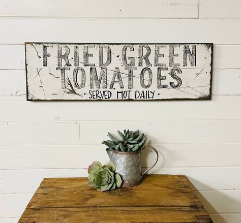 This sign is approximately 9.5 inches tall and 26 inches long. If you love old-looking stuff you will love this rustic wood sign! 'Fried Green Tomatoes' was an awesome movie and fried green tomatoes are so good! This wood sign makes the best gift for a Southern girl. Fits into a farmhouse kitchen nicely but also looks great in a country kitchen. Perfect for a cafe or restaurant. Grab one today! You May also like this Fried Green Tomatoes sign with a frame. https://www.etsy.com/listing/829101255/ Farmhouse Restaurant Decor, Southern Kitchen Decor, Tennessee Garden, Bakery Signs, Green Country Kitchen, Vintage Kitchen Signs, Farmhouse Restaurant, Bakery Sign, Movie Decor