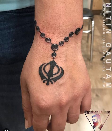 Singh Tattoo Design, Khanda Tattoo Design, Tattoos For Guys Wrist, Khanda Tattoo, Small Tattoos For Boys, Sikh Tattoo, Tattoo Designs On Hand, Wrist Band Tattoo, Trishul Tattoo Designs