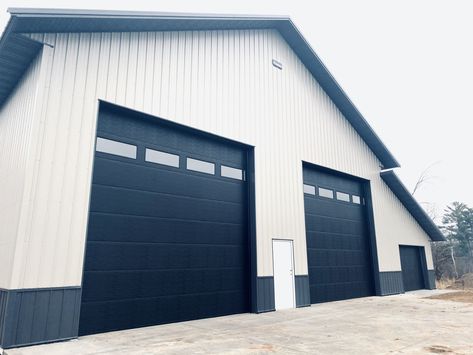 Wayne Dalton Model 5200 Garage Door in Black/Flush Panel.  Installed by Augusta Garage Door in Garrison, MN.  #polebuilding #garagedoorinstallation #augustagaragedoormn Wayne Dalton Garage Doors, Black Garage Door, Garage Build, Pole Barn Garage, Commercial Doors, Garage Door Panels, Commercial Garage Doors, Garage Exterior, Future Shop