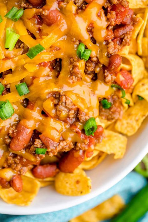 This Frito Chili Pie is filled with ground beef, Frito Corn Chips, and kidney beans for a tasty meal that hits the dinner table in just 40 minutes! Homemade Chili For Frito Pie, Chili Freeto Pie, Chili Frito Pie, Frito Chili Pie Recipe, Frito Recipe, Mexican Ideas, Frito Pie Recipe, Frito Chili, Frito Chili Pie