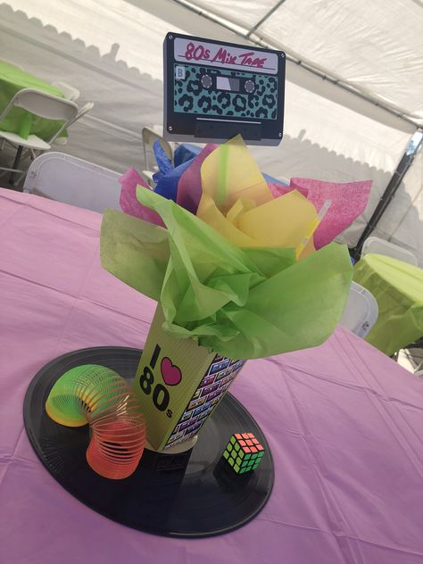 80’s party decoration Totally 80s Party, 80s Theme Centerpieces Diy, Elegant 80s Party, Eighties Party Decorations, 80s Theme Fundraiser, 1980s Party Decorations Diy, 80s Party Decorations Centerpieces, 1980s Party Centerpiece, 80s Theme Party Centerpieces