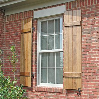 Wooden Stained Board and Batten Shutters on a Brick House Wood Shutters Exterior, Cedar Shutters, Custom Shutters, Board And Batten Shutters, House Shutters, Diy Shutters, Brick Ranch, Wooden Shutters, Red Brick House