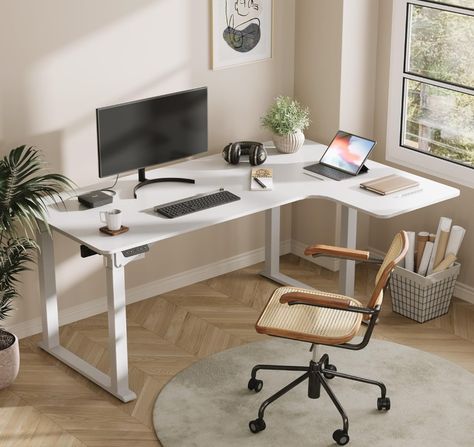 The sleek and minimalist design of the desk adds a touch of elegance to any workspace. The clean lines and smooth surface create a modern and professional atmosphere, while the spacious desktop provides ample room for all your work essentials. #wfh #homeofficeessentials #homeoffice #rising desk L Shaped Standing Desk, Corner Standing Desk, Innovative Office, Height Adjustable Desk, Home Office Table, Corner Computer Desk, Electric Standing Desk, Ergonomic Desk, Adjustable Height Standing Desk