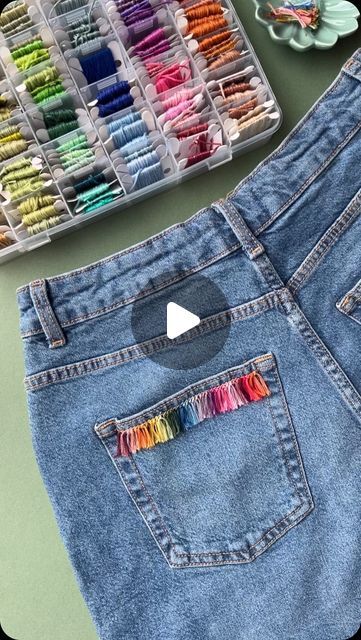 Jenny ~ Embroidery Art, Design & Crafts on Instagram: "Adding some fringe to this pocket, I love experimenting and trying fun things with threads. I hope you enjoy my videos 🩷
.
.
#embroiderythread 
#embroiderytutorial 
#upcycledclothing 
#upcycledfashion 
#embroideredflowers 
#embroideredclothing 
#embroidereddenim 
#embroideredclothes 
#embroideredflorals 
#learntoembroider 
#mindfulart 
#slowstitching 
#sewingproject 
#embroiderypatterns 
#bordadolivre 
#createdtocreate 
#diycrafts 
#slowcraft 
#dmcthreads 
#dmcembroidery 
#springflowers 
#embroiderydesign 
#beginnerembroidery 
#embroiderywork 
#denimembroidery 
#sustainablefashion 
#embroiderhappyhoops 
#embroiderytutorial 
#embroideryprocess" Fabric Crafts Diy, Learning To Embroider, Denim Embroidery, Creative Clothes, The Last Song, Upcycle Shirt, Embellished Sweatshirts, Altered Couture, Jean Pockets