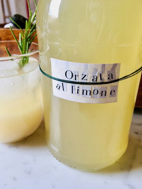 How to make barley water with a twist. Orzata al limone (Lemon barley water) is a classic among the Summer soft drinks. Easy to make and refreshing Lemon Barley Water Recipe, Drinks Easy To Make, Barley Water Recipe, Lemon Barley Water, Barley Water, Summer Soft, How To Make Homemade, Fruit Juice, Tortellini