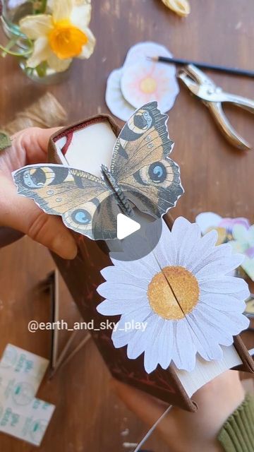 🌿Anna☀️| Crafts, Play & Learning on Instagram: "Springtime 3D bookmarks 🦋 - template available 🌼  This week we're celebrating all things butterfly and flower (ok, so not much change there with the last one) 😅 now that Spring is slowly pushing through!  Turn your books into a lovely spring garden with a collection of butterflies &  flower paper crafts! I absolutely loved making these! And they're so easy to make! I would love to make my own watercolour series but that's a project for another time 🦋  My daughter got crafting this weekend and made a bunch for her new books!  All you need is some paper, glue dots (ours are from @bostikuk ) and some scissors!  - I've made a template for you guys if you'd like to make these yourself! Let me know if you'd like a copy! -  #butterflycraft #but Flower Paper Crafts, 3d Bookmarks, Anna Craft, Butterfly Books, Butterfly And Flower, Bookmark Template, Flower Paper, Flower Bookmark, Paper Butterfly